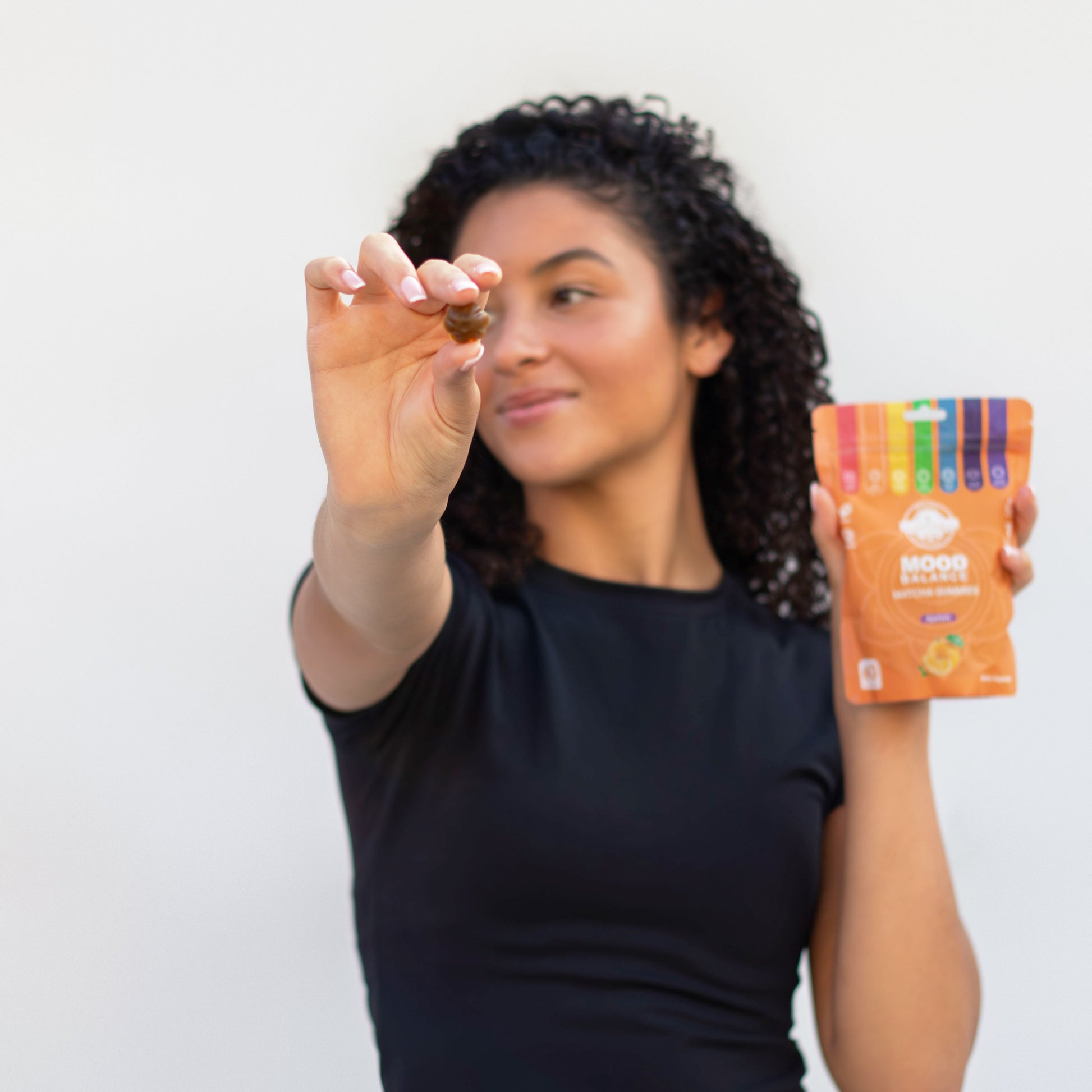 Matcha gummies in hand